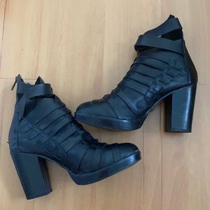 7.5 strapped black leather booties